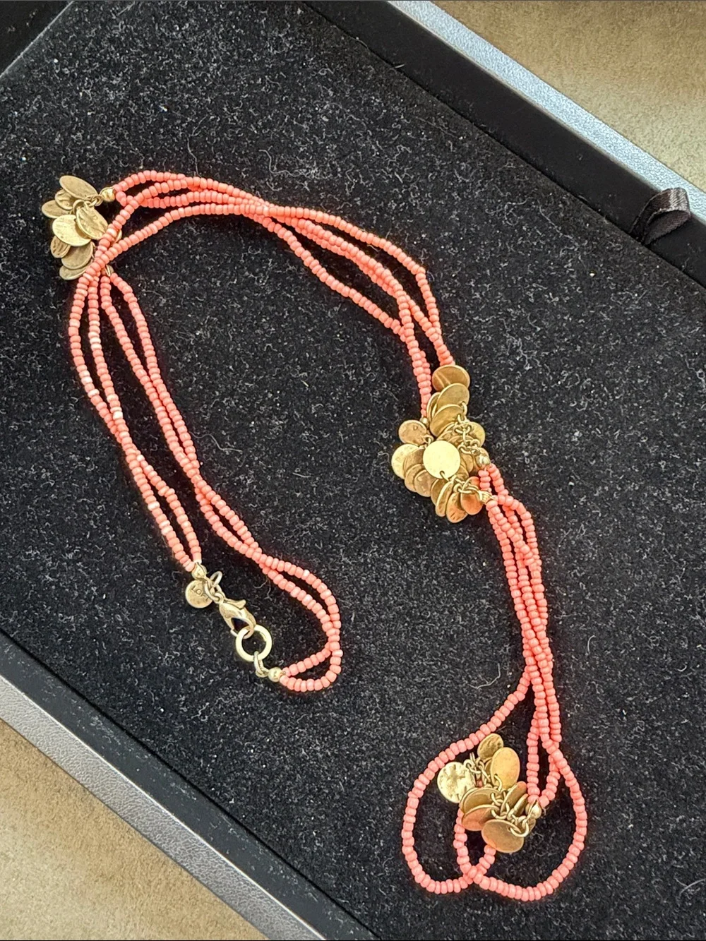 Loft long double strand necklace w/ coral seed beads and gold tone disc clusters